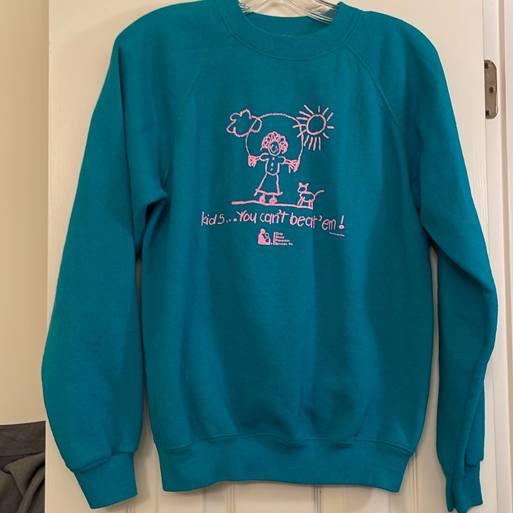 Large Hanes Sweatshirt, green with anti-child abuse message